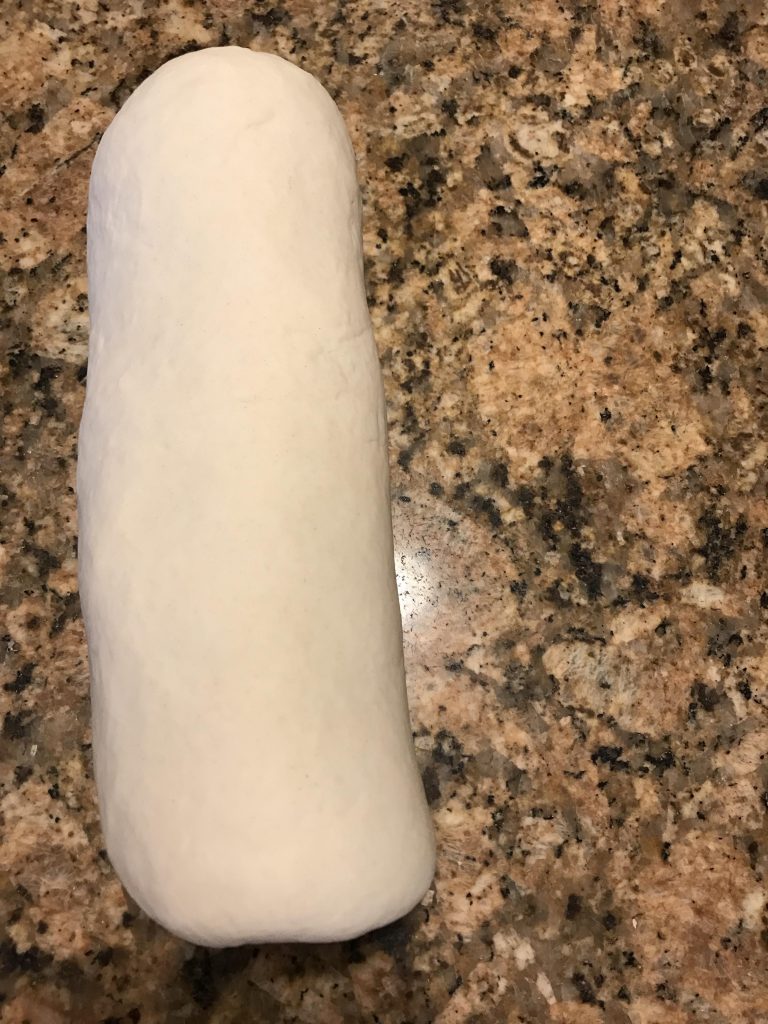 shape dough for a bread loaf