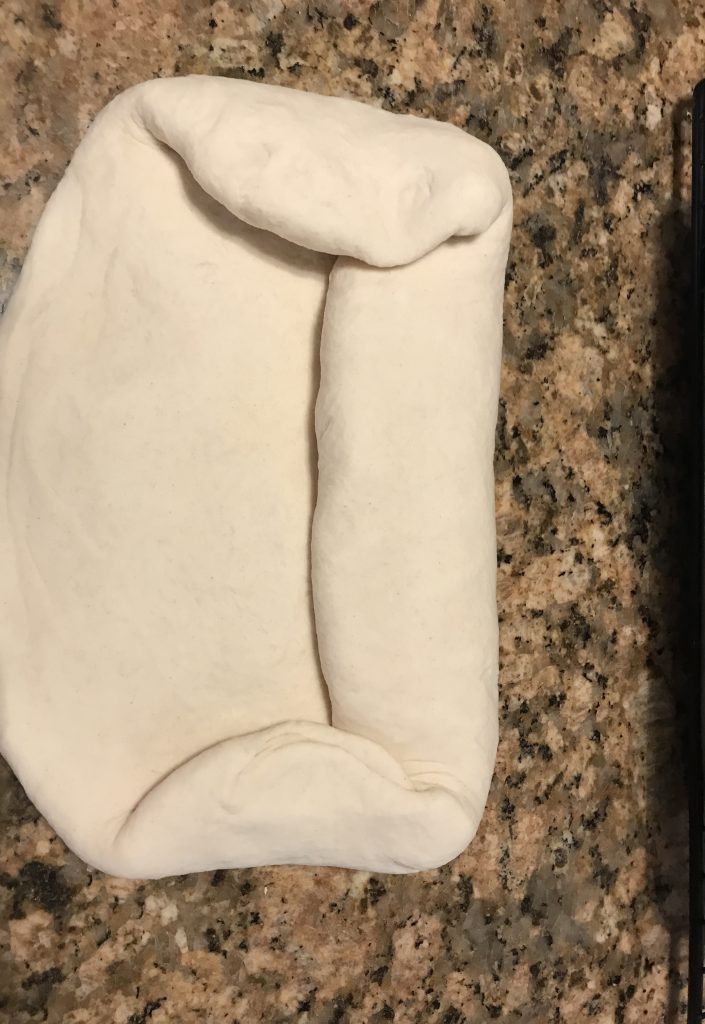 shape dough for a bread loaf