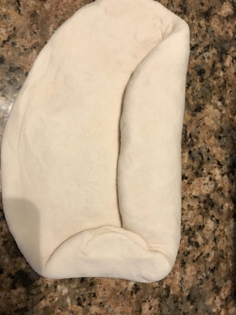 shape dough for a bread loaf