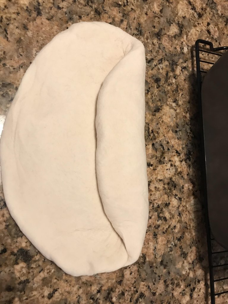 shape dough for a bread loaf