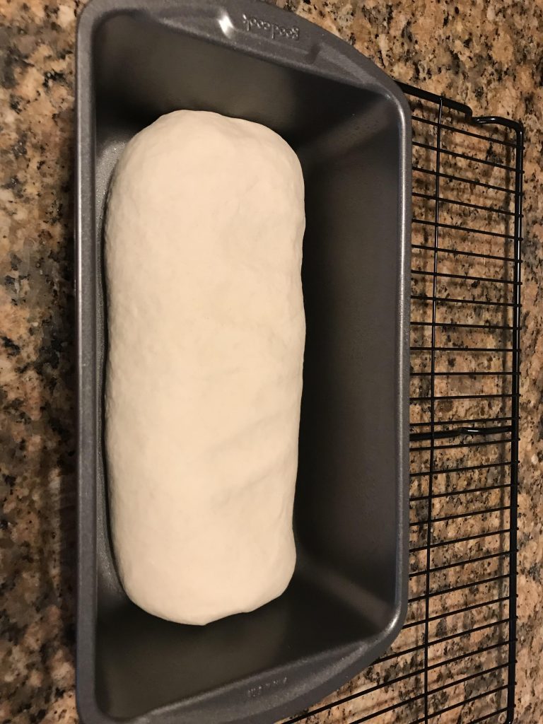 shape dough for a bread loaf